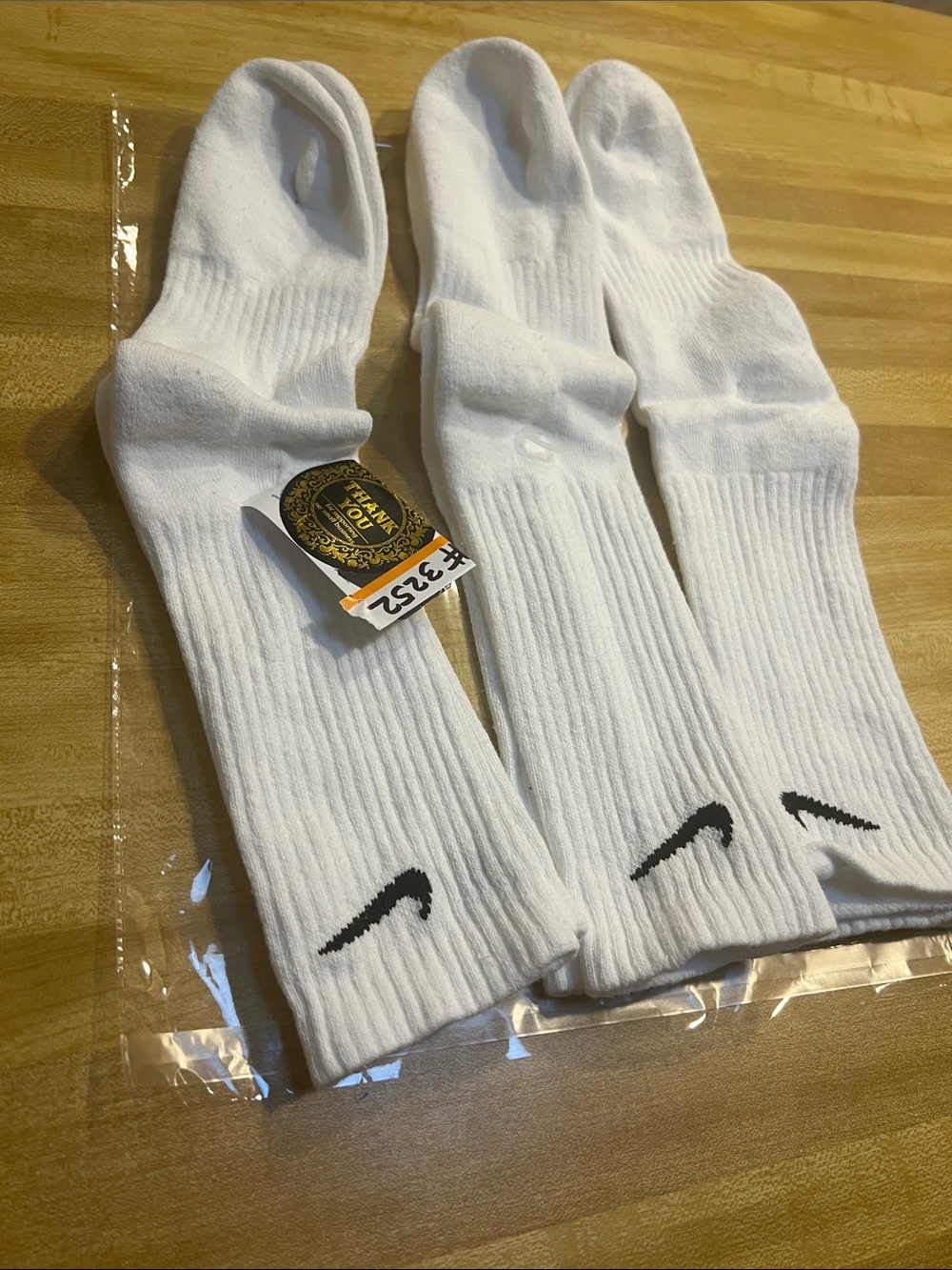 #3252**Nike White Crew Socks with Black Swoosh - Triple Pack